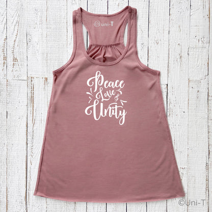 Mauve "Peace Love Unity" Tank Top - Embrace Harmony in soft fabric with white script, shown flat on a white wooden background.