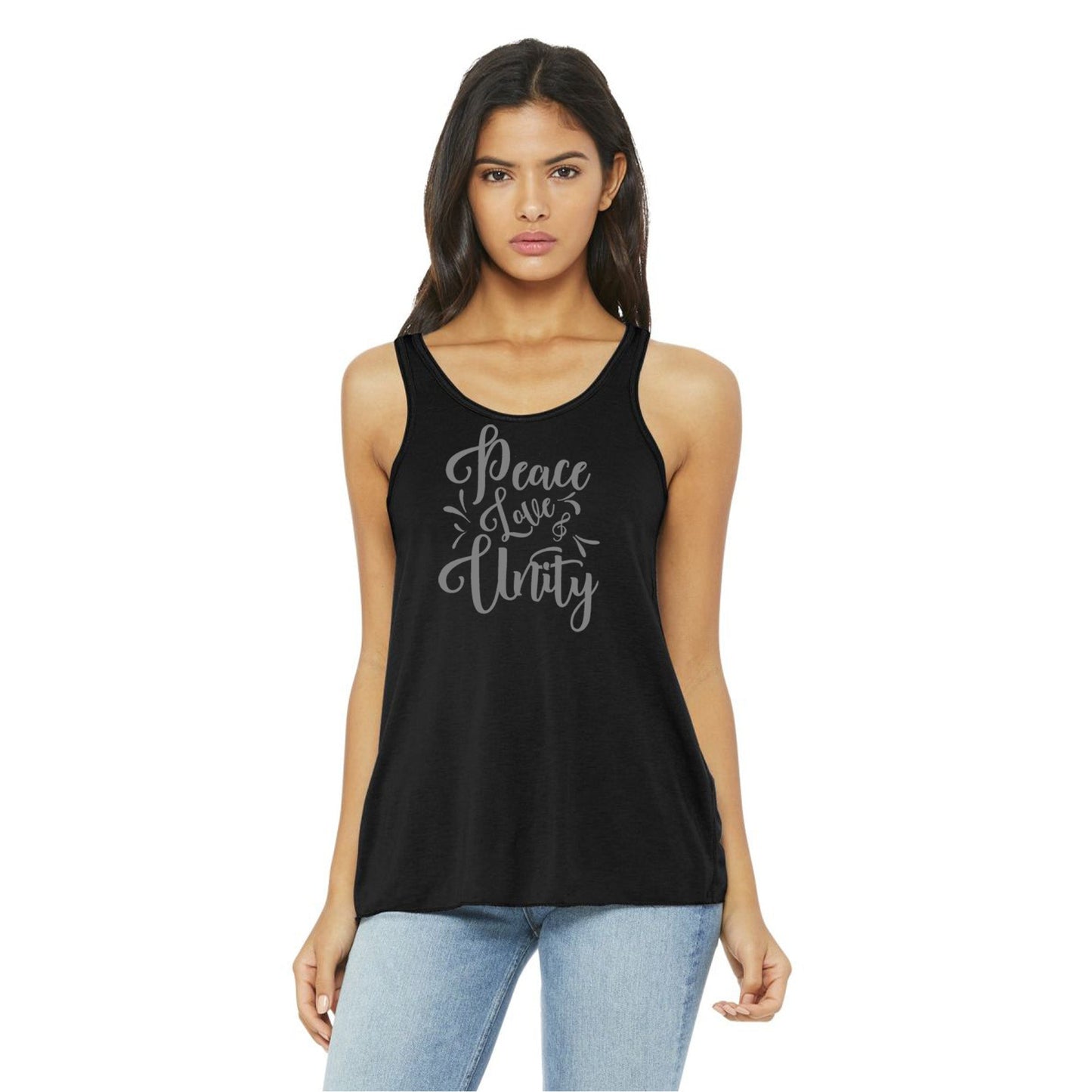 Model wearing black "Peace Love Unity" Tank Top - Embrace Harmony with gray text, styled casually with jeans for a relaxed look.