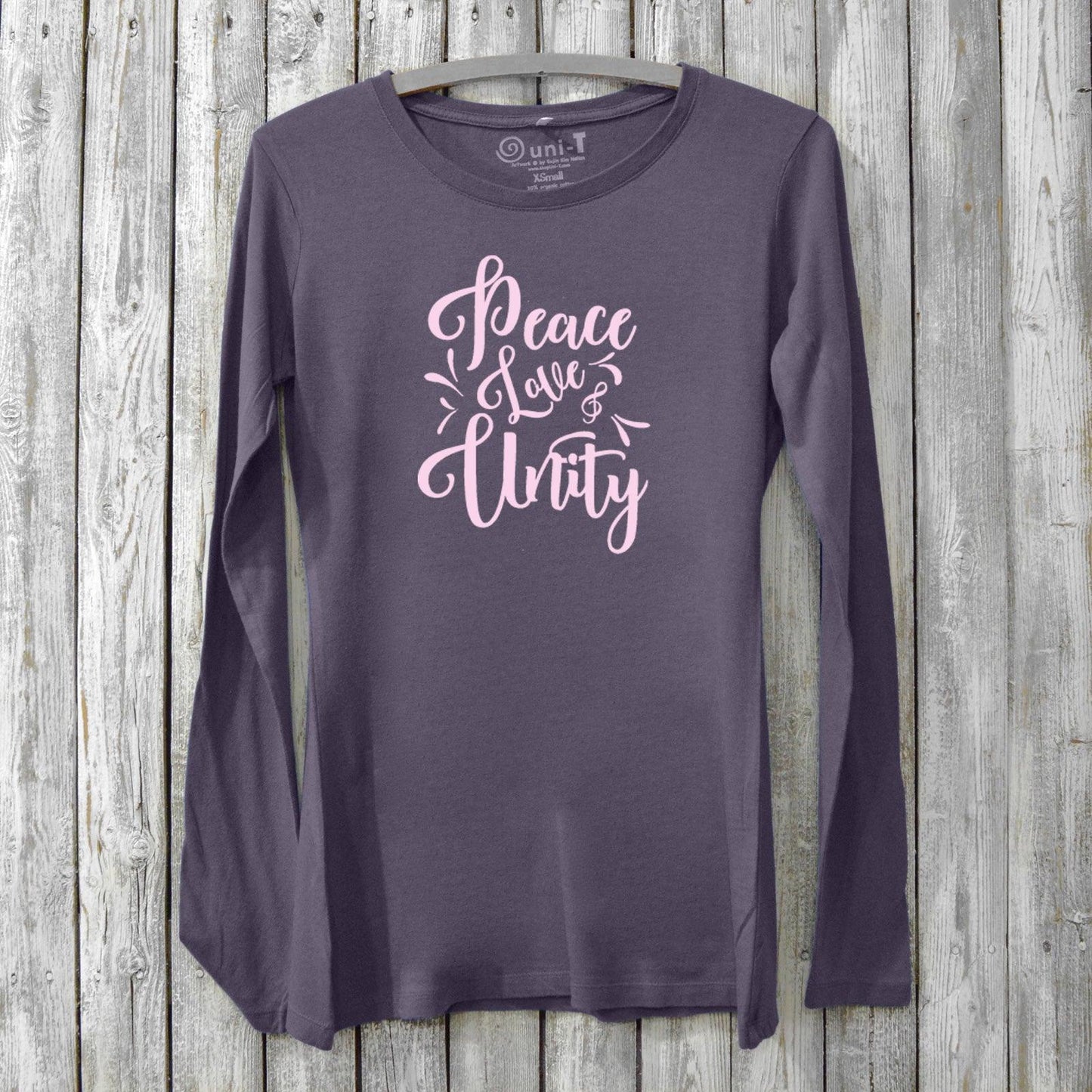 Dark purple Women’s Peace Love & Unity Long Sleeve Shirt in bamboo and organic cotton, featuring pink uplifting graphic, sustainable fashion by Uni-T.