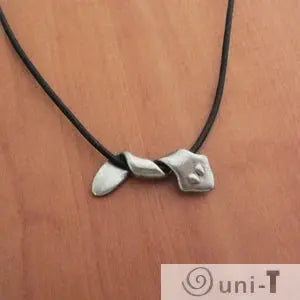 Close-up of Planarian Pendant Jewelry featuring a sculpted flatworm shape on a black necklace cord, perfect for biology lovers.