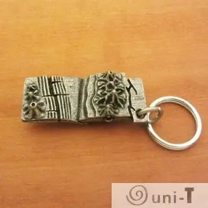 Geology-themed Plate Tectonics Keychain with textured Earth layers and tectonic features. Unique gift for geoscience lovers and students.