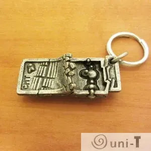 Back view of Plate Tectonics Keychain revealing internal Earth structure and labeled tectonic zones. Ideal for science education and collectors.