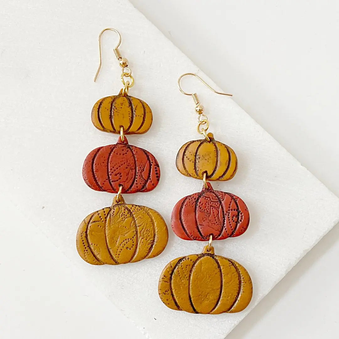 Pumpkin Earrings - Handcrafted Clay | Nickel-Free Ear Wires featuring stacked orange and mustard polymer clay pumpkins with gold hooks, ideal for fall fashion.