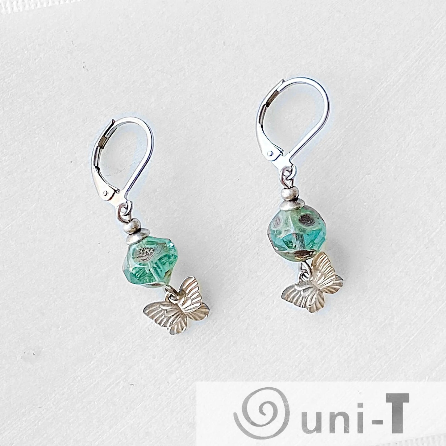 Rhodium Plated Butterfly Earrings with Turquoise Glass Beads - Surgical Steel Ear Wire Kathy James