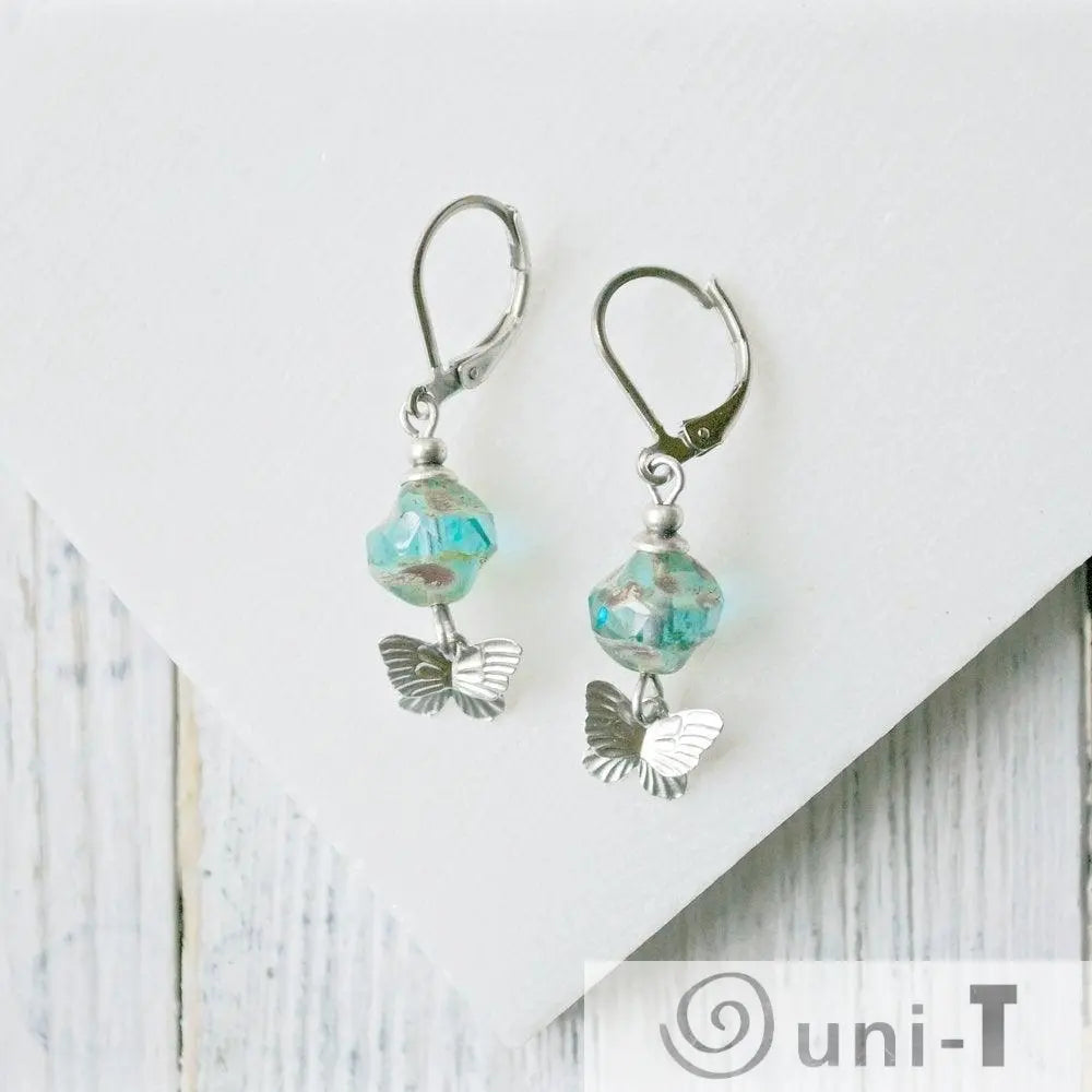 Rhodium Plated Butterfly Earrings with Turquoise Glass Beads - Surgical Steel Ear Wire Kathy James