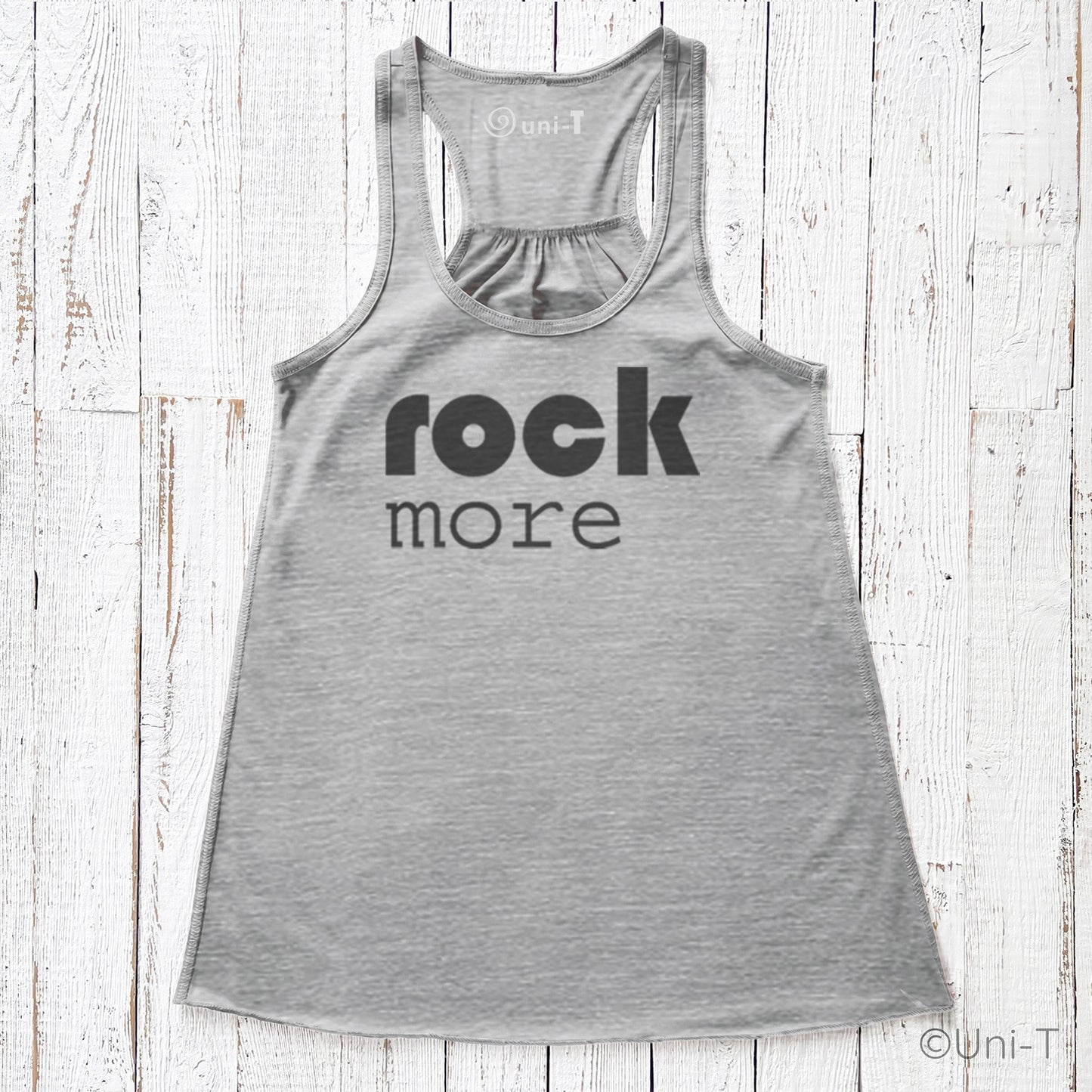 Gray Rock More Women's Flowy Tank Top with black lettering, soft eco-friendly fabric and draped silhouette, perfect for everyday comfort.
