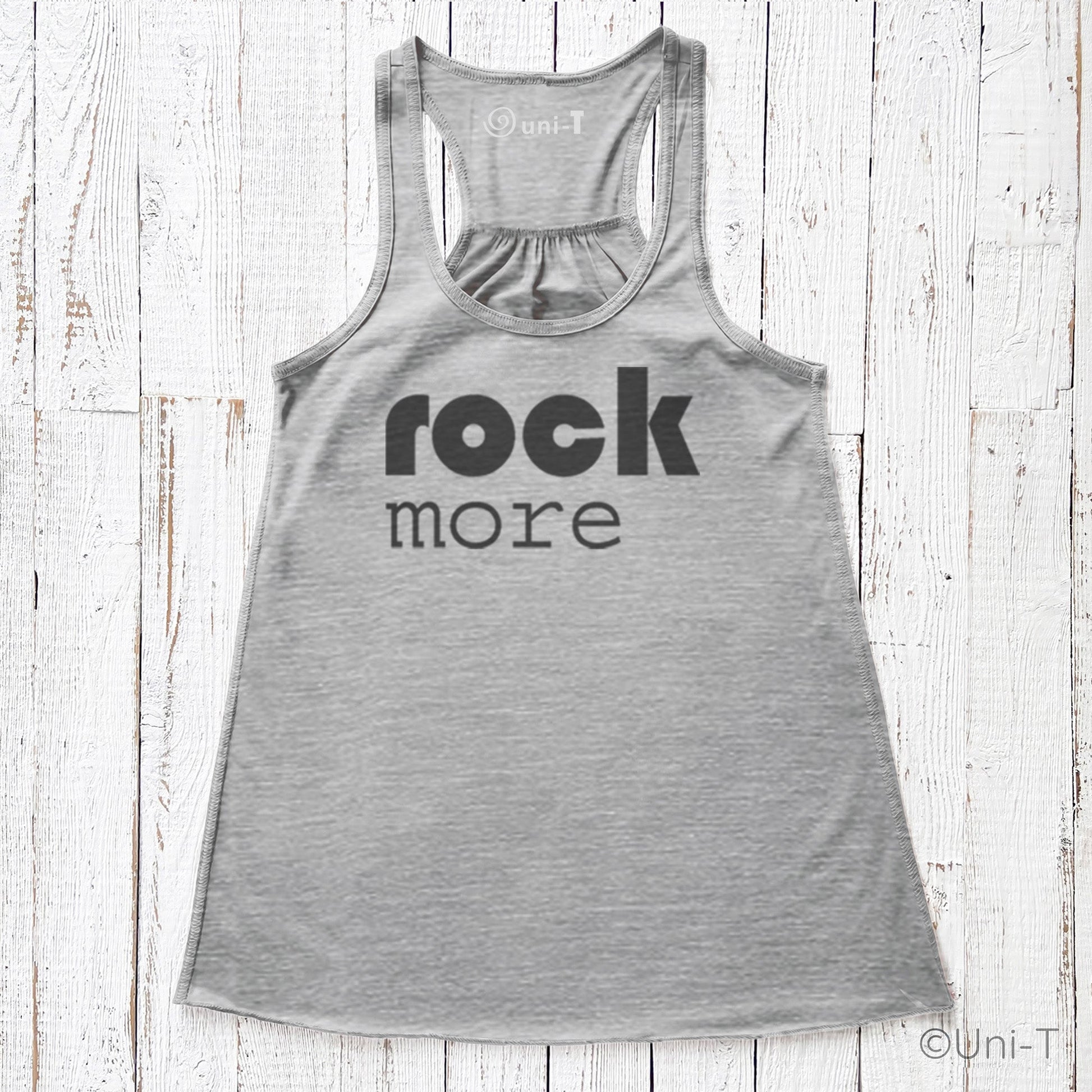 Gray Rock More Women's Flowy Tank Top with black lettering, soft eco-friendly fabric and draped silhouette, perfect for everyday comfort.