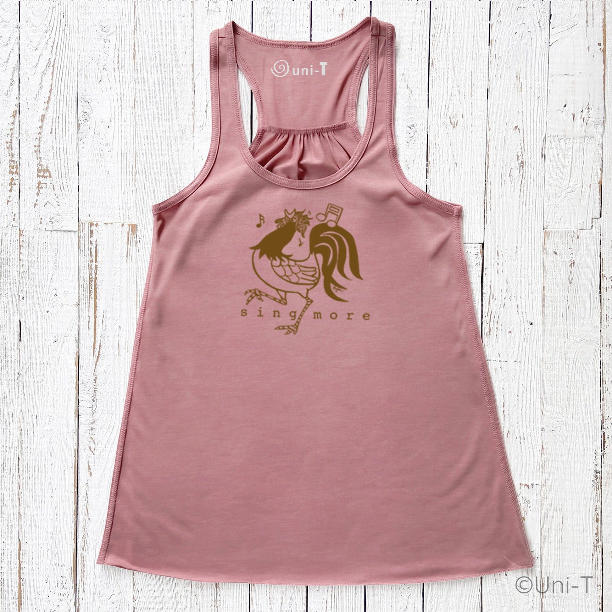 Rooster Flowy Tank Top - Sing More in mauve pink with brown rooster graphic and musical notes, ideal for vocal confidence and expressive style.