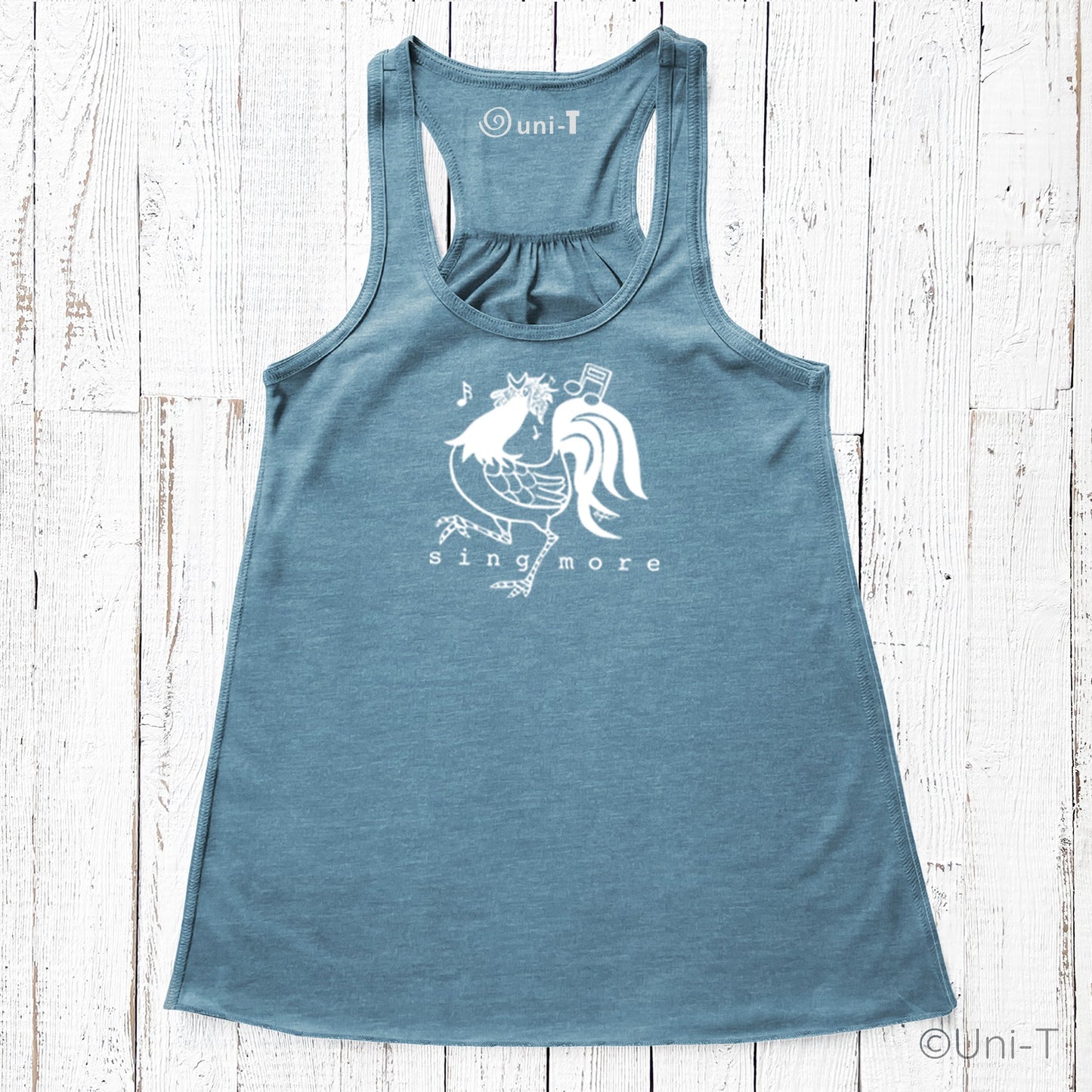 Blue Rooster Flowy Tank Top - Sing More featuring a white rooster design with music notes, perfect for confident singers and casual wear.