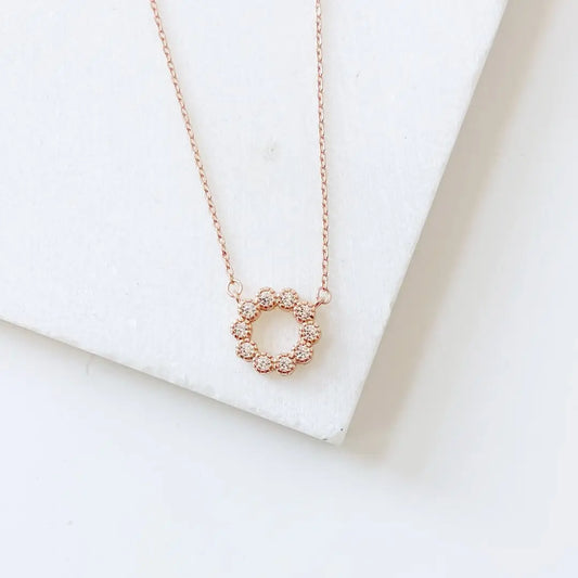 Delicate Rose Gold Circle Necklace featuring sparkling cubic zirconia on 18in adjustable silver chain, ideal for everyday or special occasions.