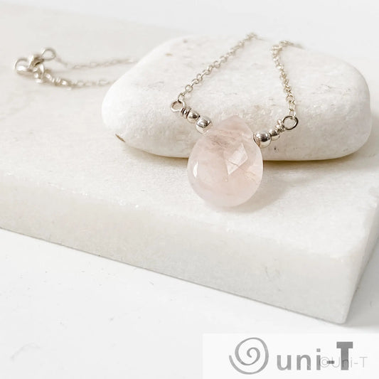 Buy Rose Quartz Gemstone Necklaces Online - Uni-T features a teardrop rose quartz pendant on a sterling silver chain with spring ring clasp.