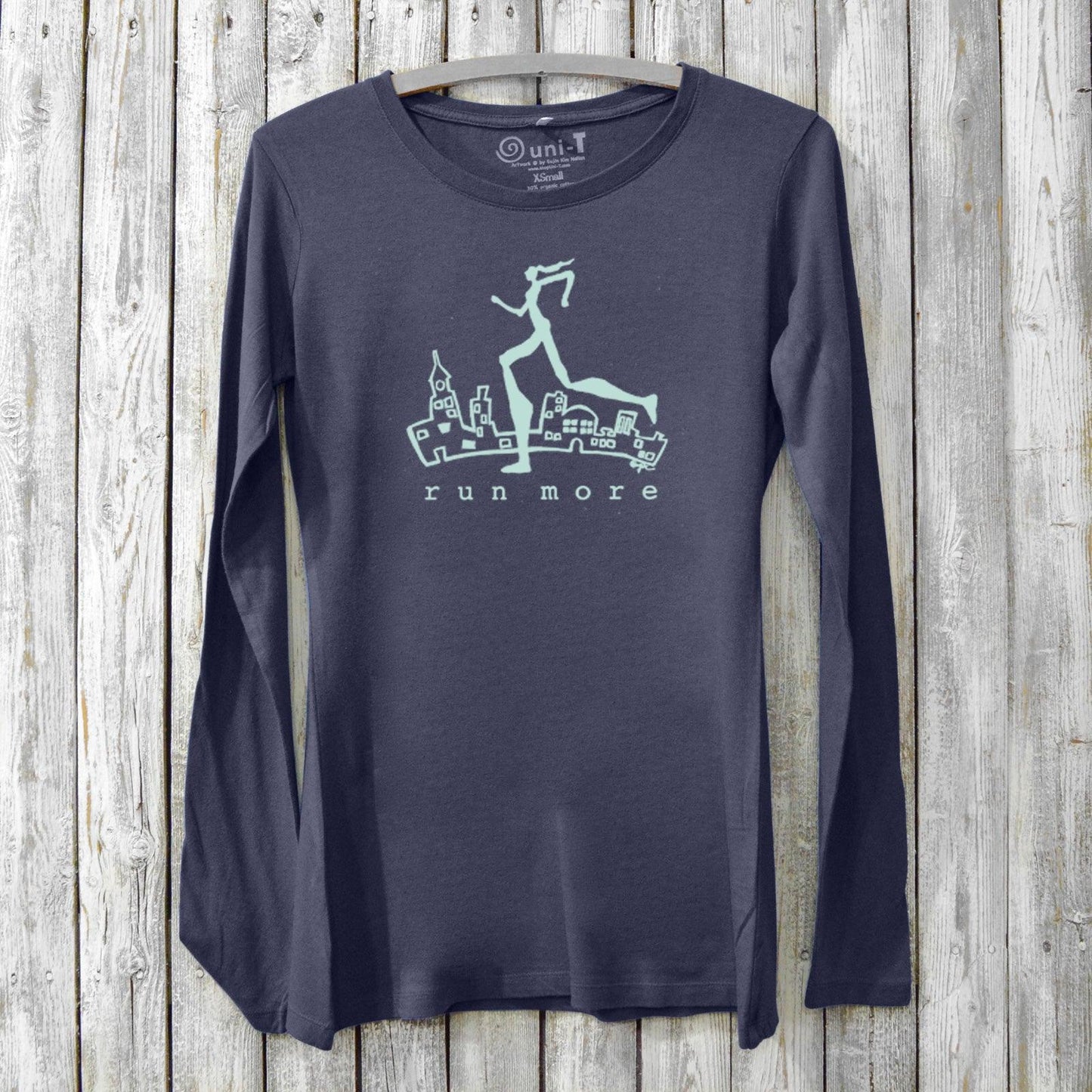 Run More Long Sleeve T-Shirt Women in navy blue featuring a runner and city design. Eco-friendly bamboo cotton fitness top for active lifestyles.