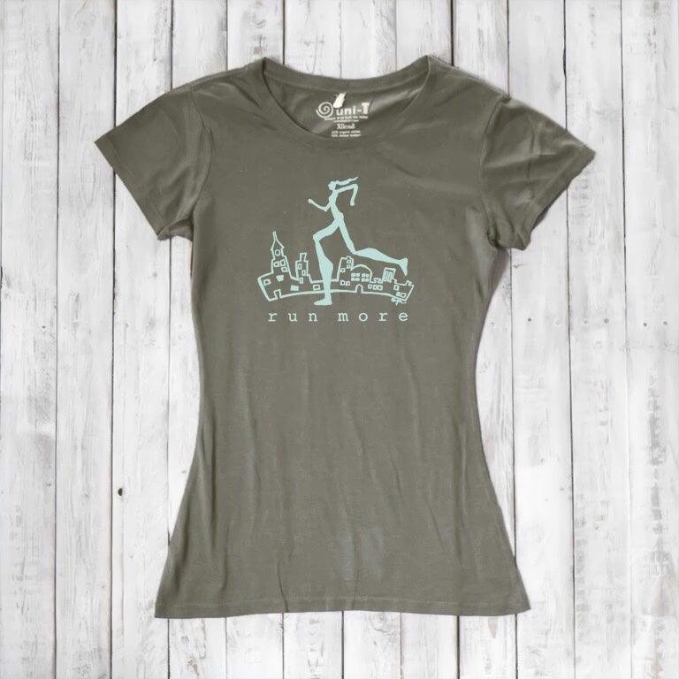 Olive green women's bamboo and organic cotton t-shirt with 'Run More' cityscape graphic, perfect eco-friendly athletic wear for runners.