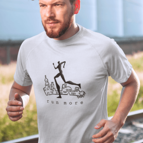 White 'Run More' men's athletic T-shirt in bamboo and organic cotton, shown in action by a runner, perfect for fitness enthusiasts.