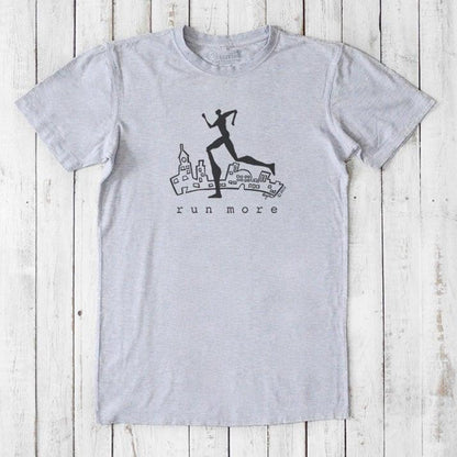 Heather gray 'Run More' men's graphic T-shirt in bamboo and organic cotton, featuring a black cityscape and runner silhouette.