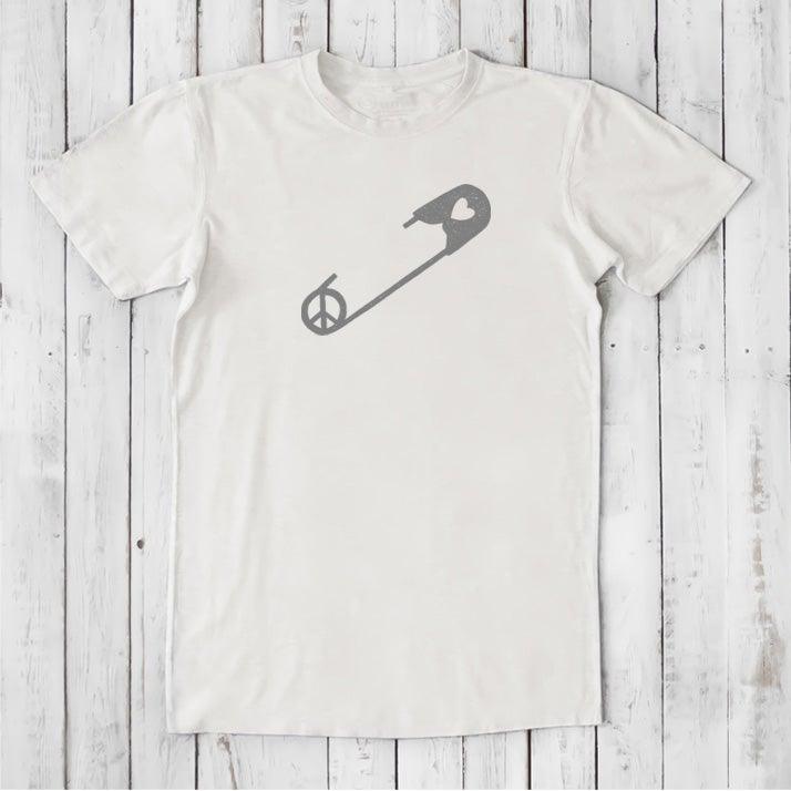 White 'Safety Pin Ally' men's t-shirt in bamboo & organic cotton with gray peace and heart pin graphic. Minimalist design for proud allies.