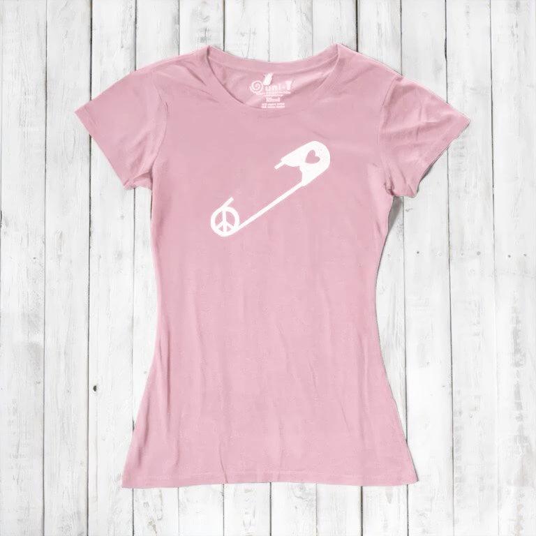 Pink Women's Peace & Love T-Shirt with white safety pin and heart graphic. Eco-friendly bamboo cotton tee for social justice supporters.