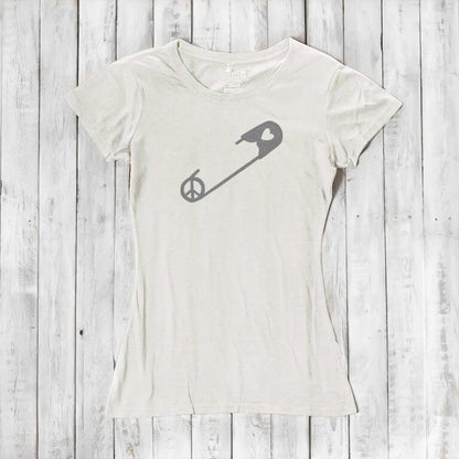 Ivory Women's Peace & Love T-Shirt with gray safety pin and peace sign graphic. Organic cotton blend tee for unity and love expression.