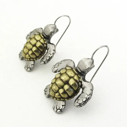 Two-toned Sea Turtle Earrings featuring detailed Loggerhead Turtle design in pewter and brass. Lightweight turtle jewelry for ocean lovers.