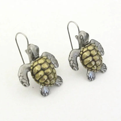 Loggerhead Turtle Earrings crafted in pewter and brass with intricate shell texture. Unique sea turtle jewelry accessory for marine enthusiasts.