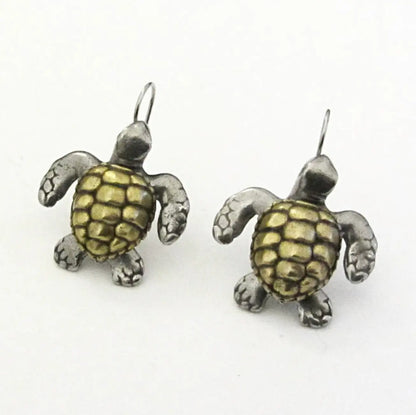 Handcrafted Sea Turtle Earrings with realistic Loggerhead Turtle shape in dual-tone metal. Ideal gift for turtle lovers and ocean-themed fashion.