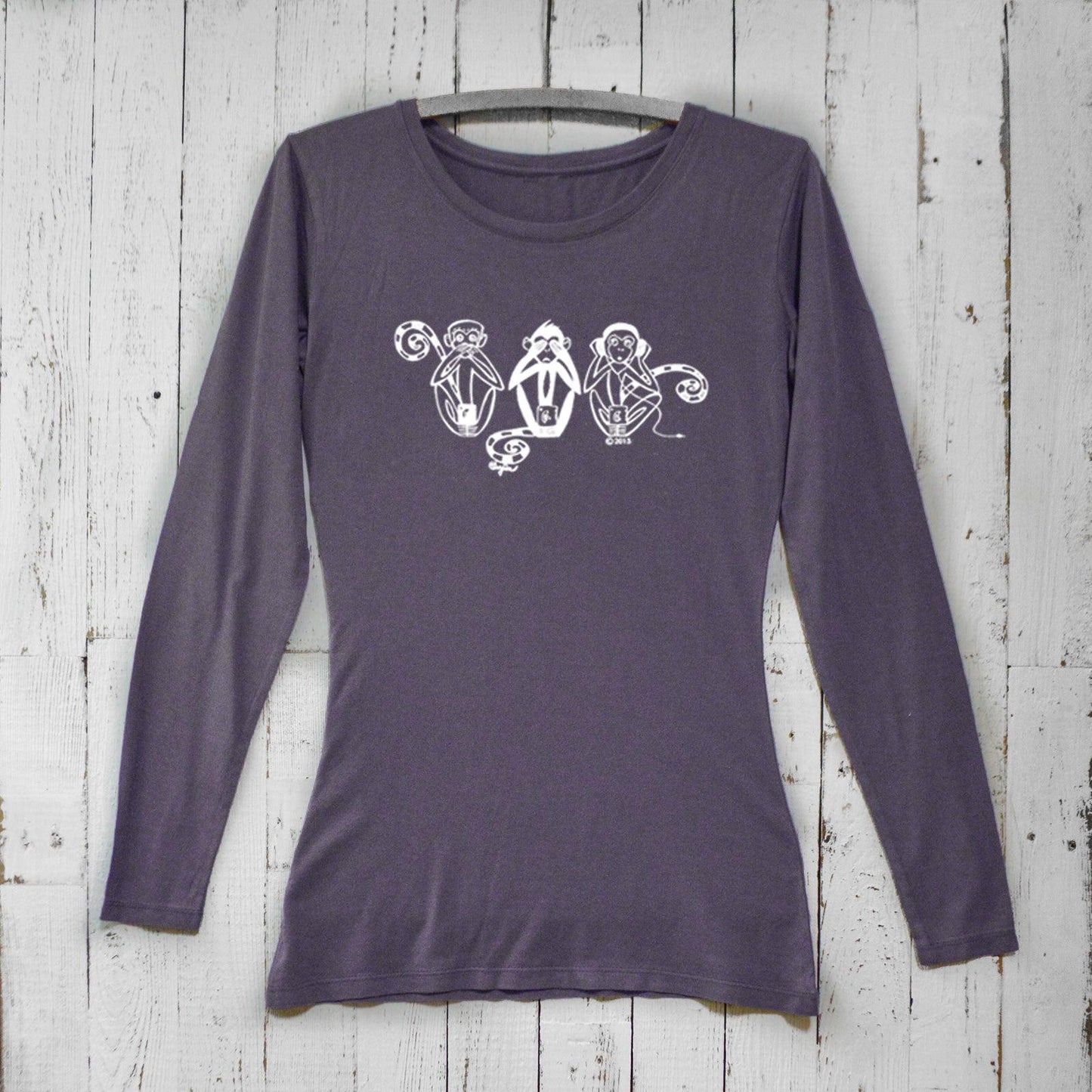 Dark purple women's bamboo long sleeve t-shirt featuring See No Evil Hear No Evil Speak No Evil monkey print. Eco-friendly organic cotton top.