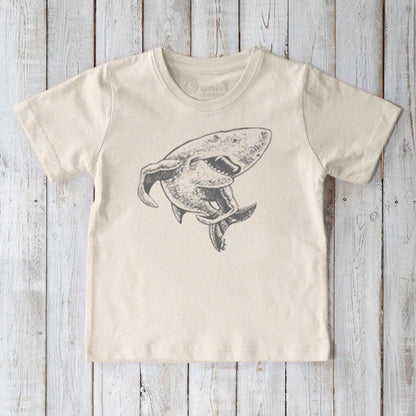 Kids' Shark Organic Cotton T-Shirt in cream featuring a grey shark graphic. Sustainable animal lover top for children by Uni-T.