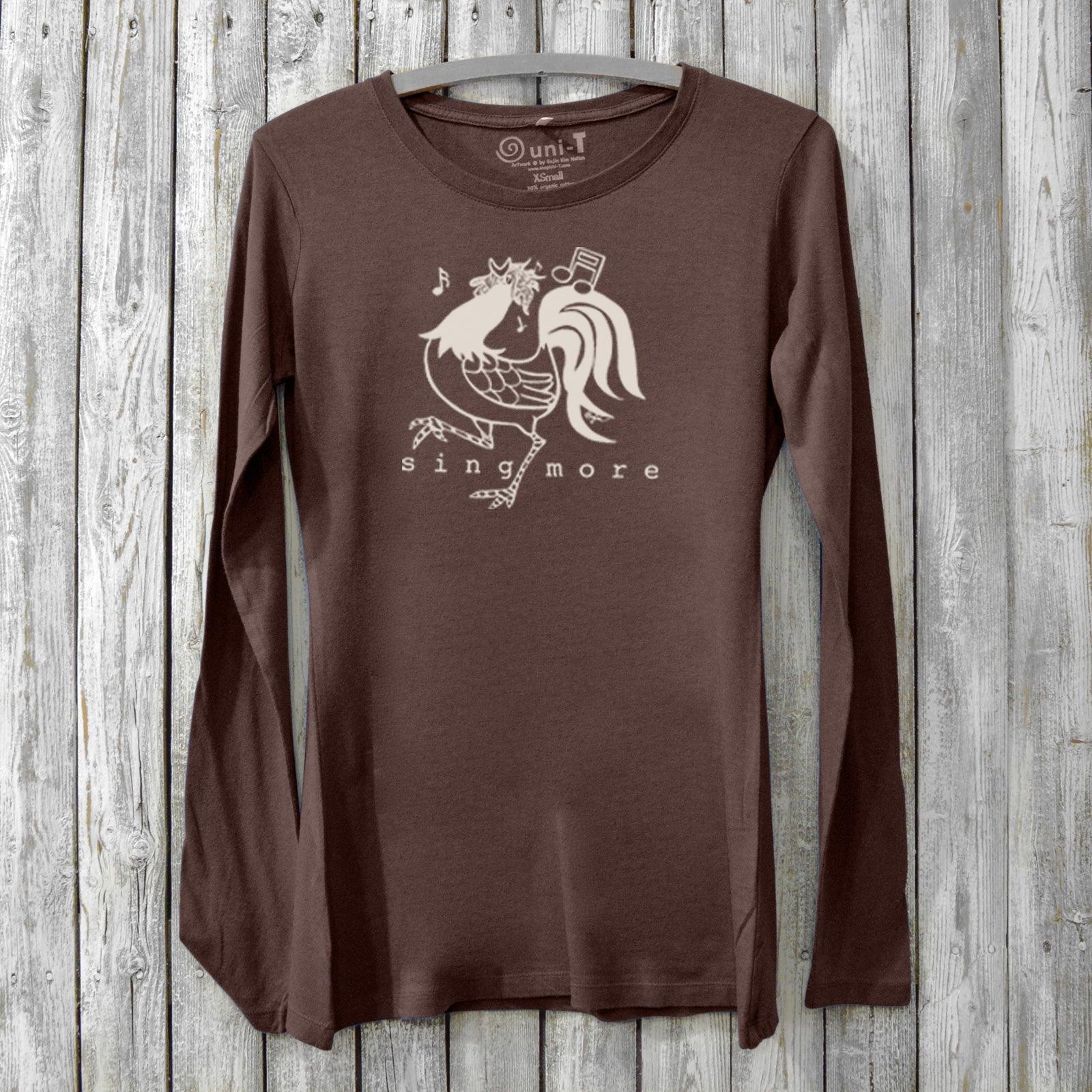 Sing More Women's Bamboo Long Sleeve T-Shirt in dark brown with rooster graphic and musical notes. Eco-friendly organic cotton blend for music lovers.