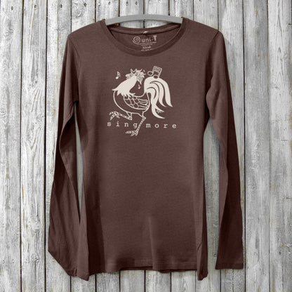Sing More Women's Bamboo Long Sleeve T-Shirt in dark brown with rooster graphic and musical notes. Eco-friendly organic cotton blend for music lovers.