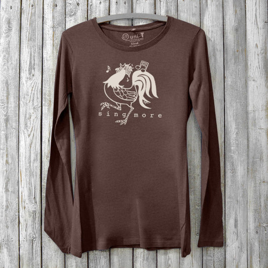 Sing More Women's Bamboo Long Sleeve T-Shirt in dark brown with rooster graphic and musical notes. Eco-friendly organic cotton blend for music lovers.