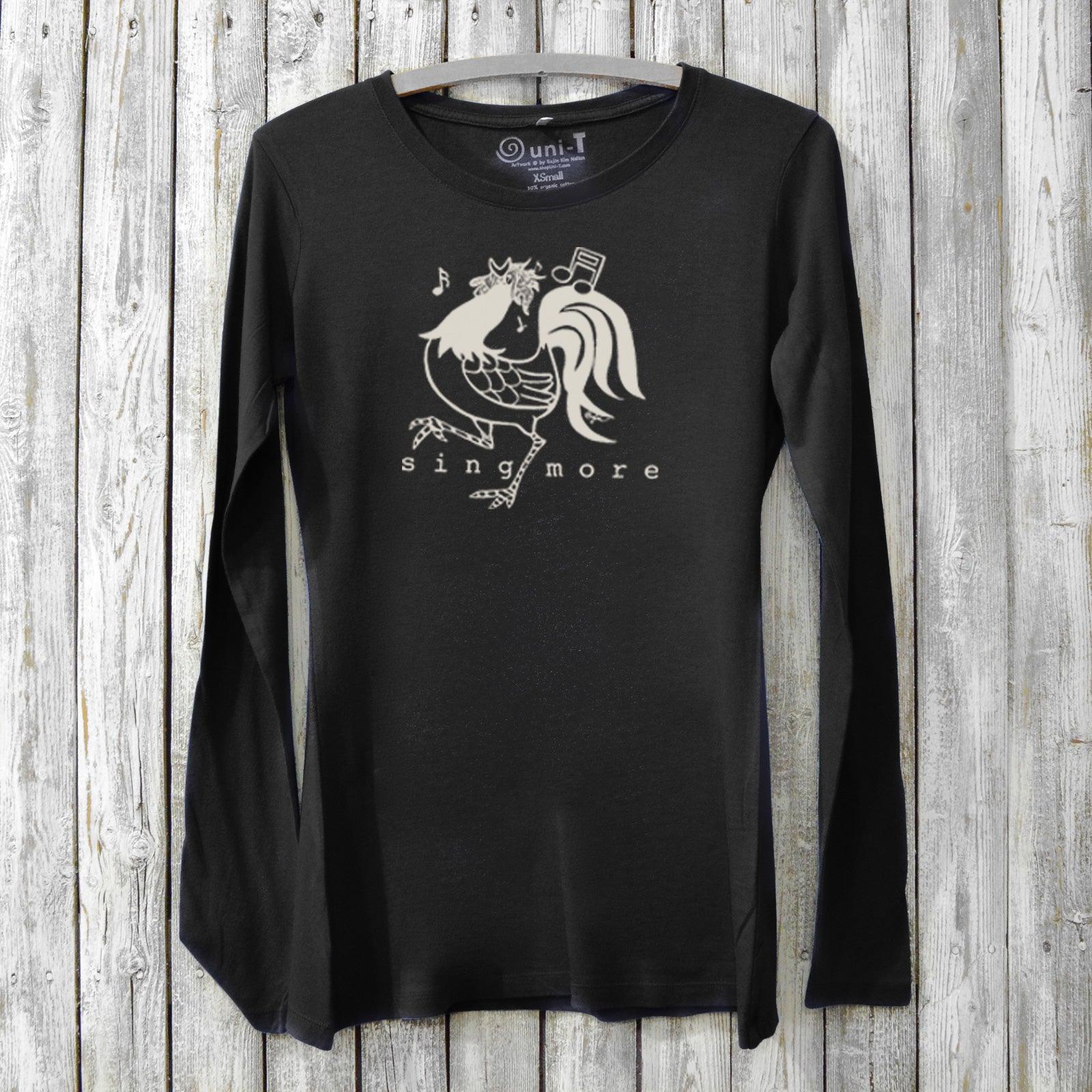 Black Sing More Women's Bamboo Long Sleeve T-Shirt with expressive rooster and music note print. Organic cotton blend for singers and music fans.