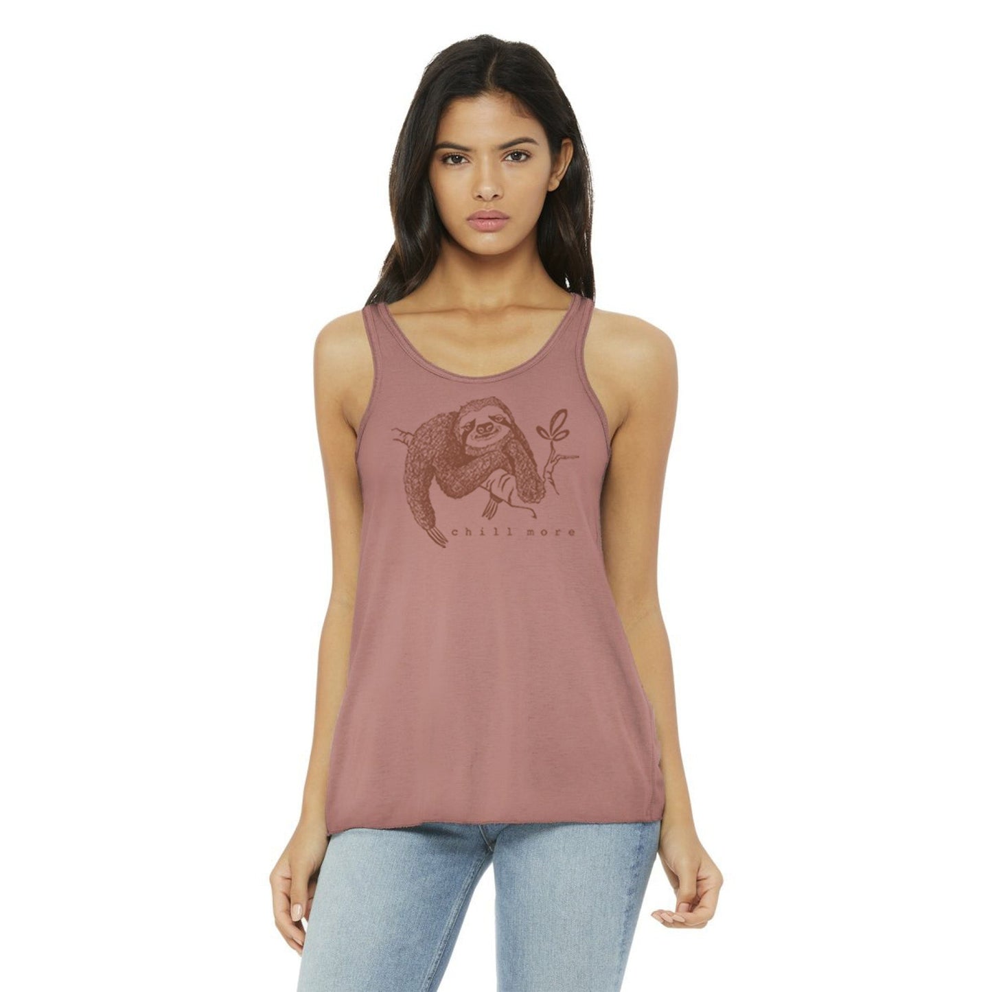 Model wearing "Chill More" Women's Flowy Tank Top in mauve, showcasing soft fabric and sloth graphic for a mindful, casual lifestyle look.