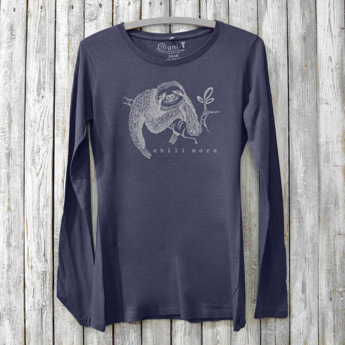 Navy women's sloth long sleeve T-shirt in bamboo and organic cotton with 'Chill More' design. Comfortable animal graphic loungewear top.