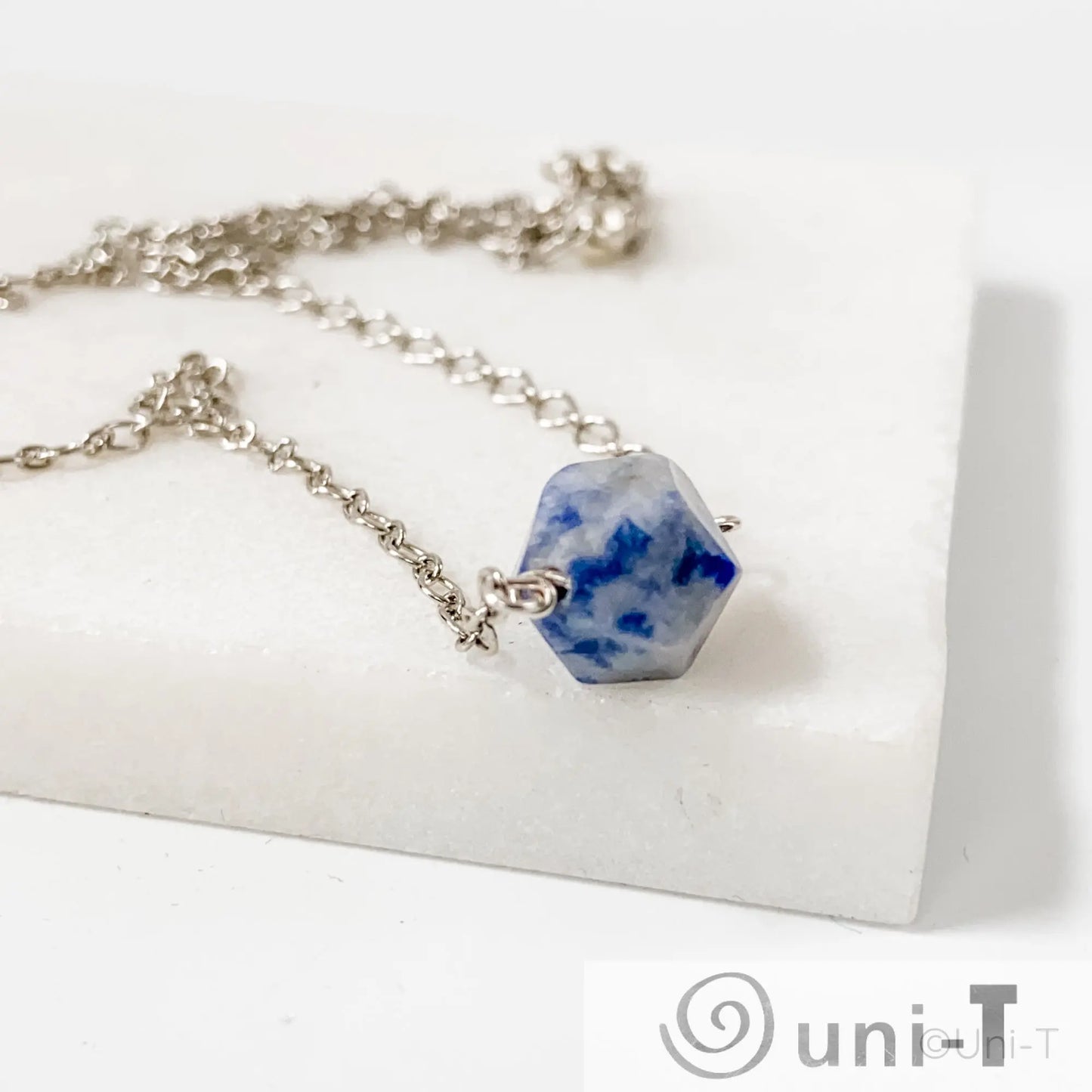 Buy Sodalite Gemstone Necklaces Online - Uni-T features a faceted blue sodalite stone on an 18-inch sterling silver chain with spring ring clasp.