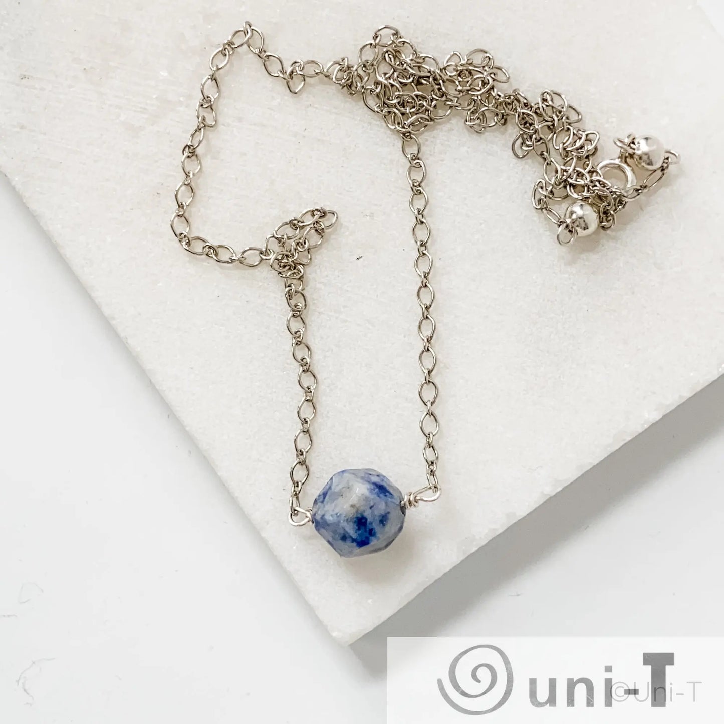 Dainty Sodalite Gemstone Necklace from Uni-T with hand-cut blue gemstone centered on a sterling silver chain, perfect for layering or gifting.