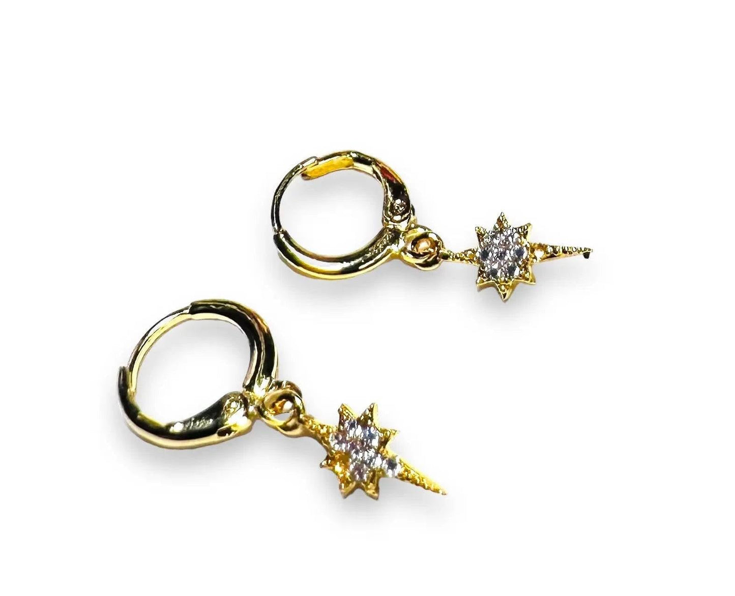 Cubic Zirconia Star Huggie Hoops in gold, showcasing celestial star charms for a stylish and secure earring design.