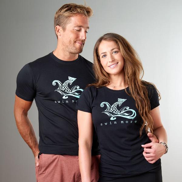 Men's Swimming T-Shirt in Bamboo & Organic Cotton worn by couple, featuring 'Swim More' graphic. Ideal beach or pool gift for him.