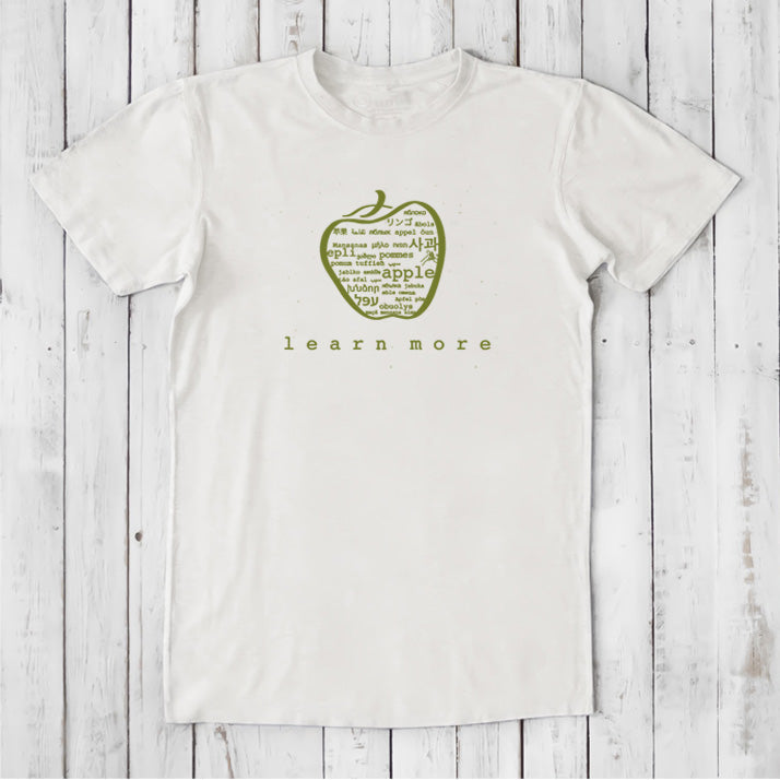 White Uni-T Inspirational Graphic Tee for men with green apple graphic and 'learn more' slogan, sustainable gift for educators.