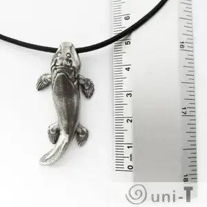Tiktaalik Necklace - Celebrate Evolution | Unique Design shown with ruler for scale, highlighting pendant size and intricate fish details.