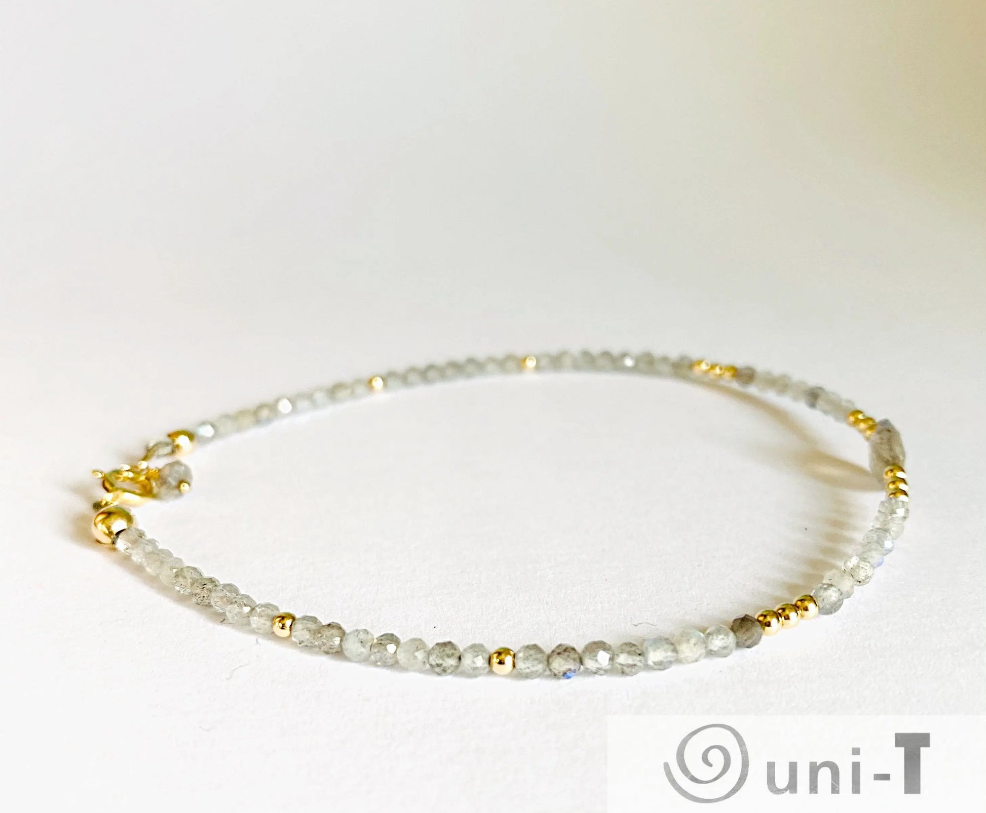 Delicate 7.5” Moonstone Sparkle Bracelet featuring faceted moonstone beads and gold accents. Lightweight and stylish for layering or solo wear.