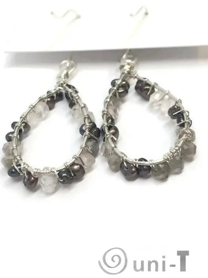 Back view of Pearl Quartz Teardrop Hoop Earrings - Sterling Silver highlighting wire-wrapped quartz and pearl beads on a teardrop hoop.