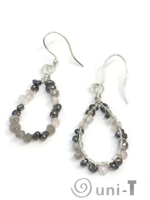 Detailed view of mismatched Pearl Quartz Teardrop Hoop Earrings - Sterling Silver with hand-cut quartz and pearl beads in a teardrop shape.