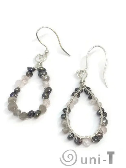 Detailed view of mismatched Pearl Quartz Teardrop Hoop Earrings - Sterling Silver with hand-cut quartz and pearl beads in a teardrop shape.