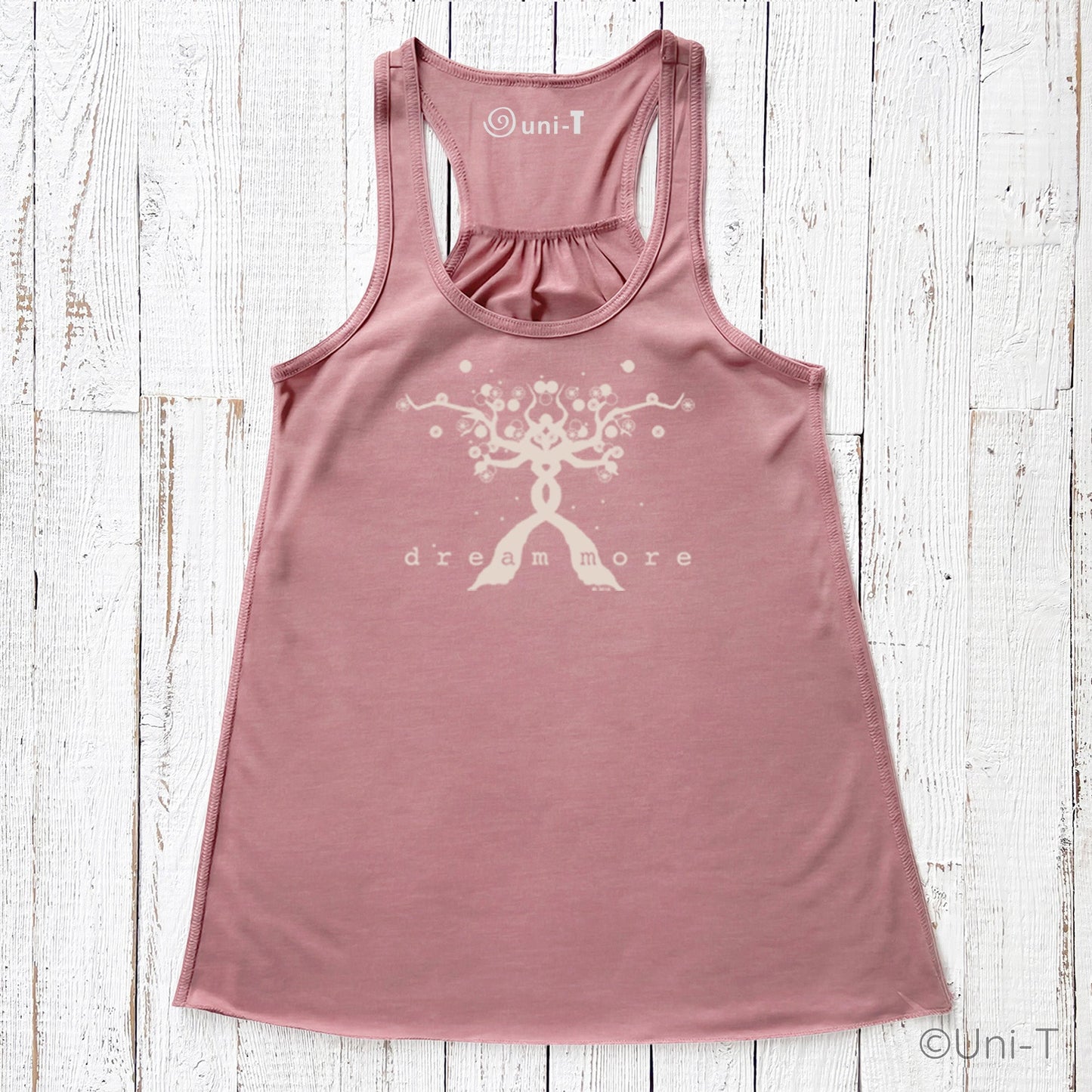 Rose pink Dream More Tank Top for Women with white tree graphic, soft and flowy racerback ideal for inspirational and nature-themed outfits.