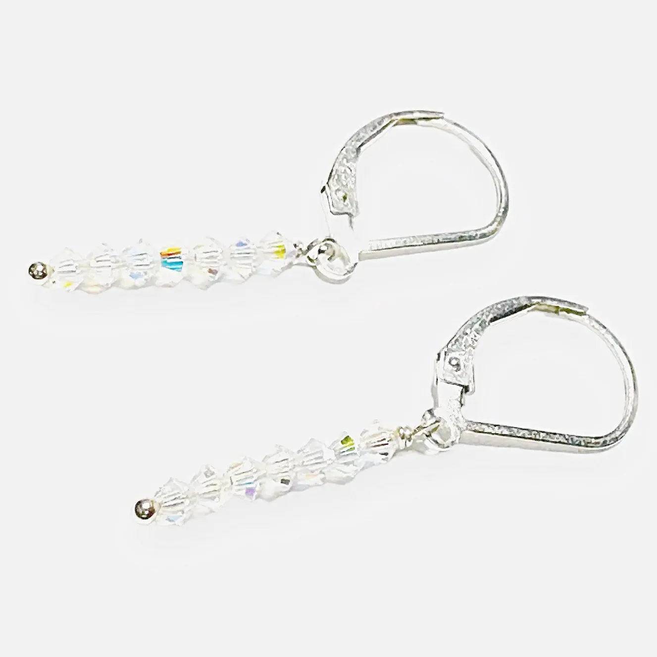 Side view of Glitter Stixx Gemstone Earrings showing clear faceted beads and silver hardware, ideal for adding subtle shimmer to outfits.