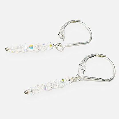 Side view of Glitter Stixx Gemstone Earrings showing clear faceted beads and silver hardware, ideal for adding subtle shimmer to outfits.