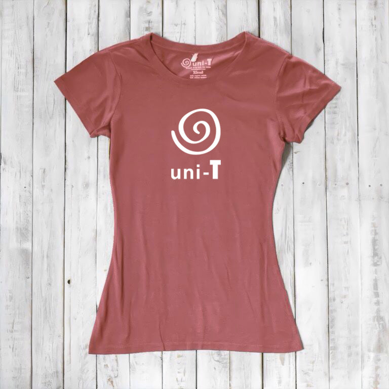 Women's Uni-T Logo T-Shirt in dusty rose bamboo and organic cotton, featuring white spiral unity graphic, sustainable gift idea.