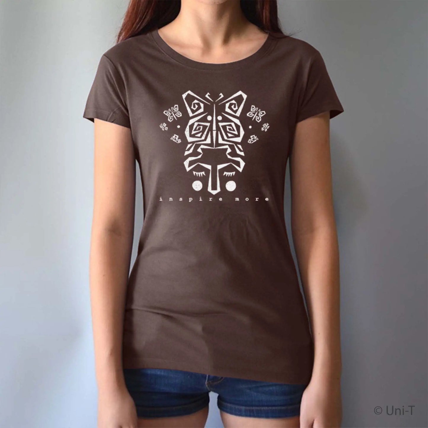 Brown bamboo and organic cotton women's t-shirt with white butterfly art and 'Inspire More' text. Eco-friendly inspirational graphic tee by Uni-T.