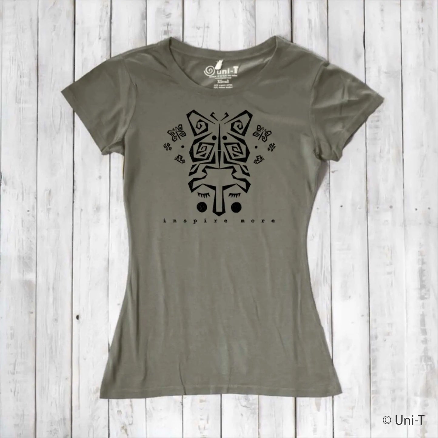 Olive green women's bamboo and organic cotton t-shirt with black butterfly face graphic and 'Inspire More' message. Sustainable nature-inspired tee.