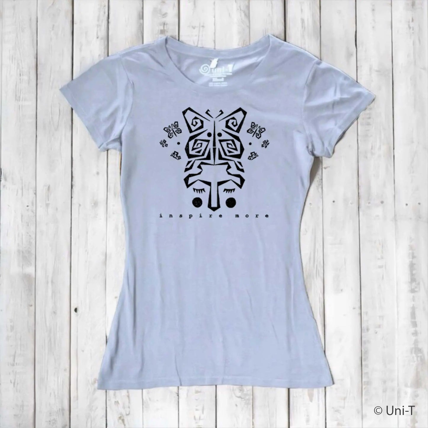 Light gray women's bamboo and organic cotton t-shirt with black butterfly face graphic and 'Inspire More' text. Eco-conscious inspirational clothing.